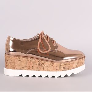 black and gold platform sneakers